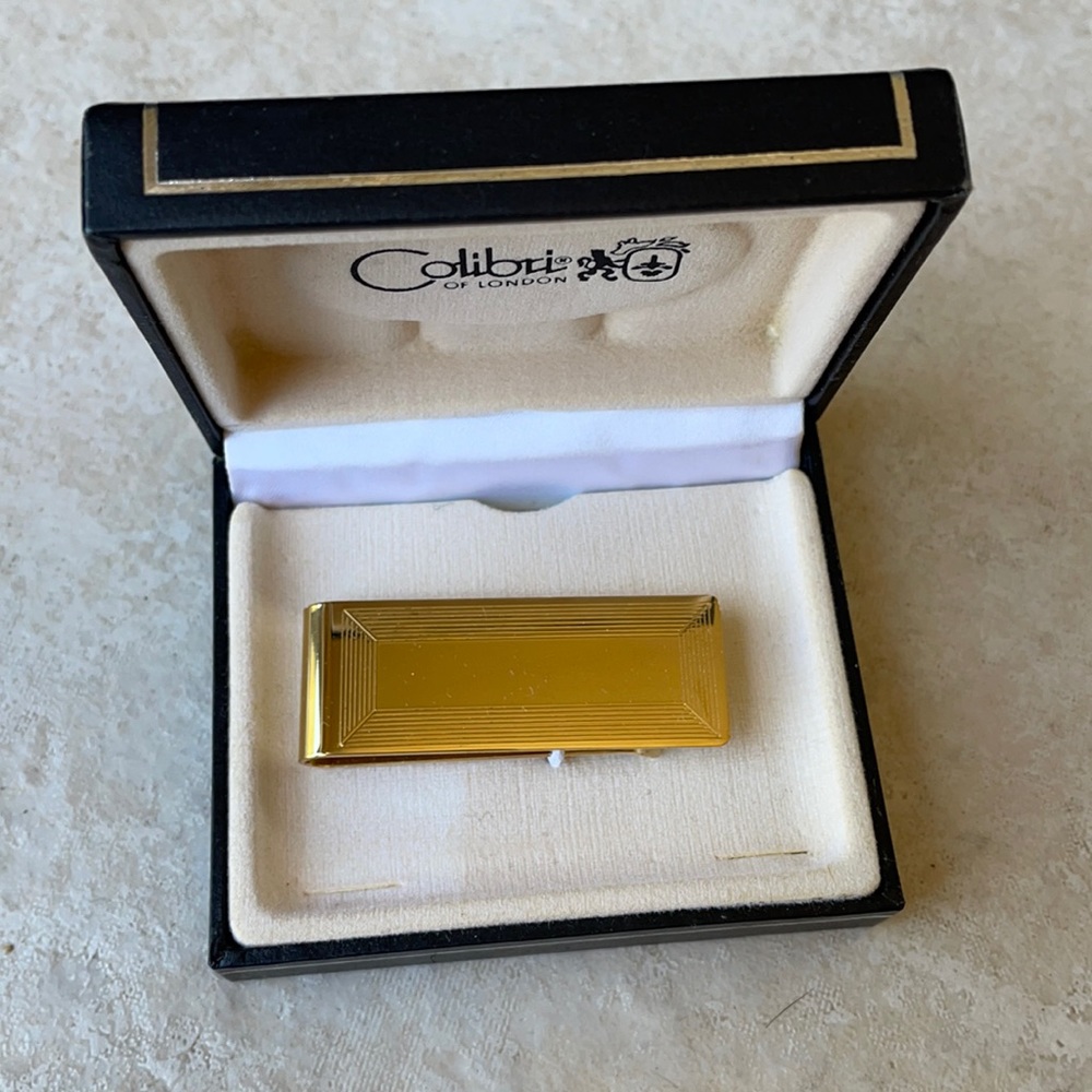 Colibri money lip gold tone